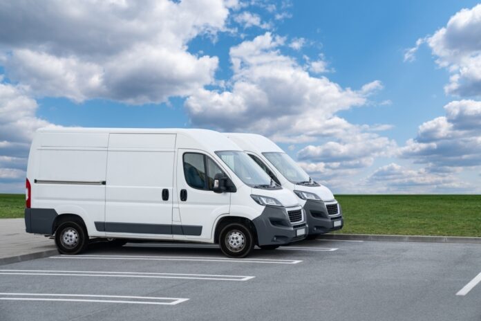 Vans,Are,Parked,In,Row.,Commercial,Fleet